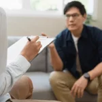 Man meets with a qualified psychiatric medical examiner.
